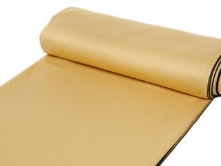 Blackout fabric gold by Stofex.