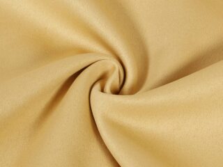 Blackout fabric gold by Stofex.