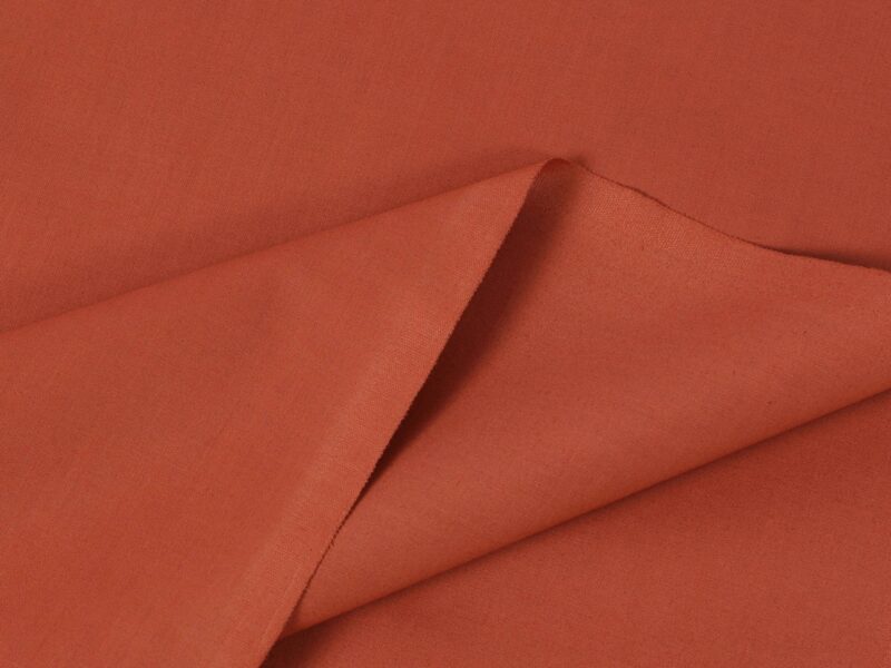 Cotton fabric brick red by Stofex.