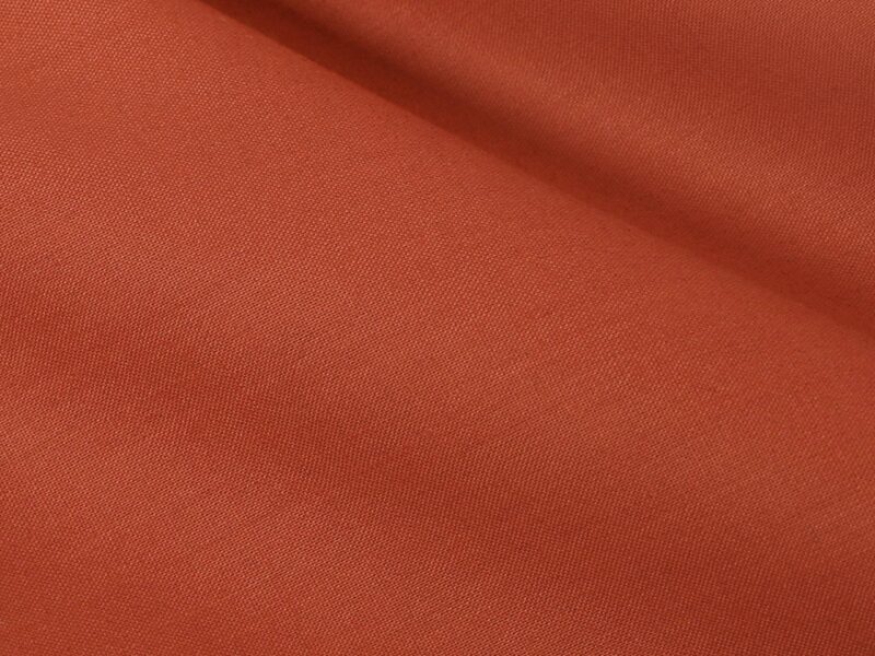 Cotton fabric brick red by Stofex.