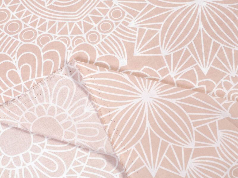 Cotton fabric white mandalas on salmon by Stofex.