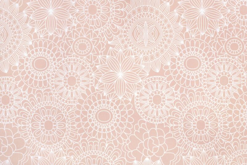 Cotton fabric white mandalas on salmon by Stofex.