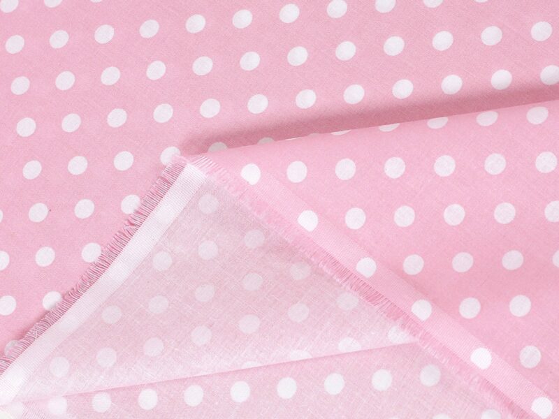 Cotton fabric polka dots on pink by Stofex.