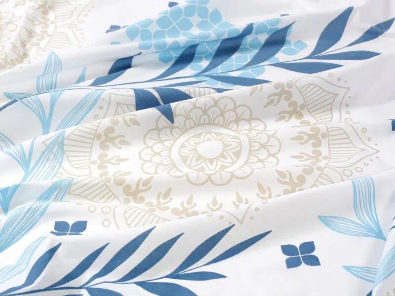 100% Cotton fabric blue leaves with mandala by Stofex.