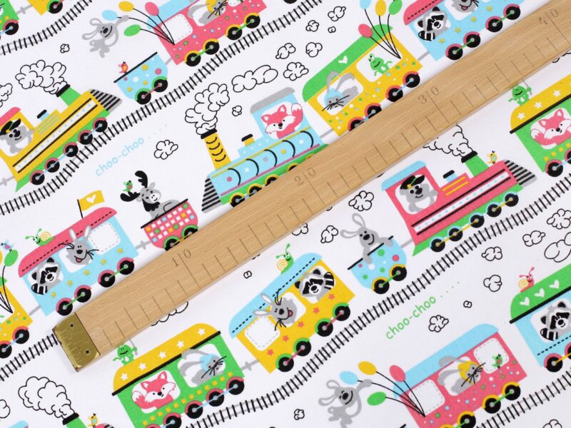 Cotton fabric trains on white by Stofex.