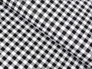 Cotton fabric black checkered by Stofex.