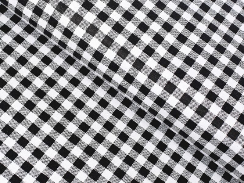 Cotton fabric black checkered by Stofex.