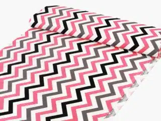 Cotton fabric pink and black zigzag by Stofex.