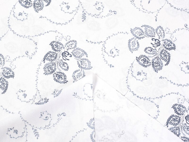 Cotton fabric blue ornaments on white by Stofex.