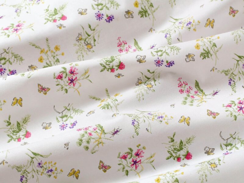 100% Cotton fabric meadow with butterflies by Stofex.