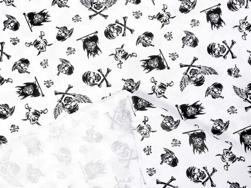 Cotton fabric black skulls on white by Stofex.