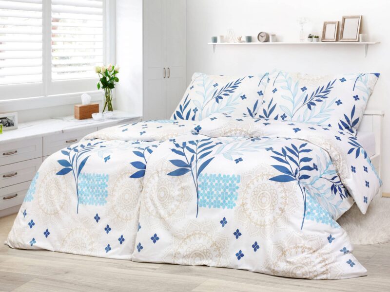 Satin bed linen with blue leaves and manadalas by Stofex.