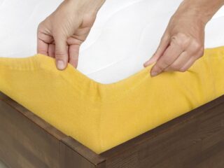 Terry fitted sheet ochre with elastic band by Stofex.