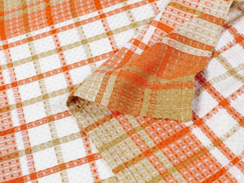 Waffelhandtuch mit Bambusfaser in orange-beige, 50x70 cm von Stofex.