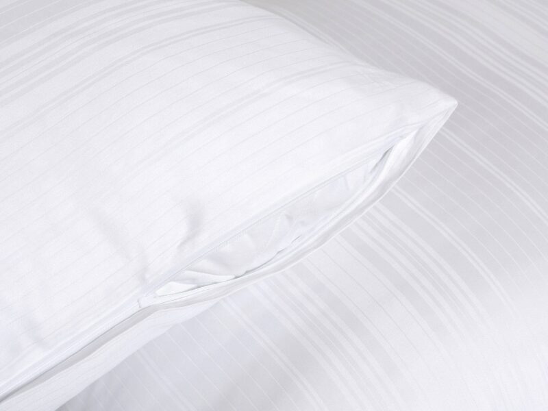 White damask bed linen with stripes by Stofex.