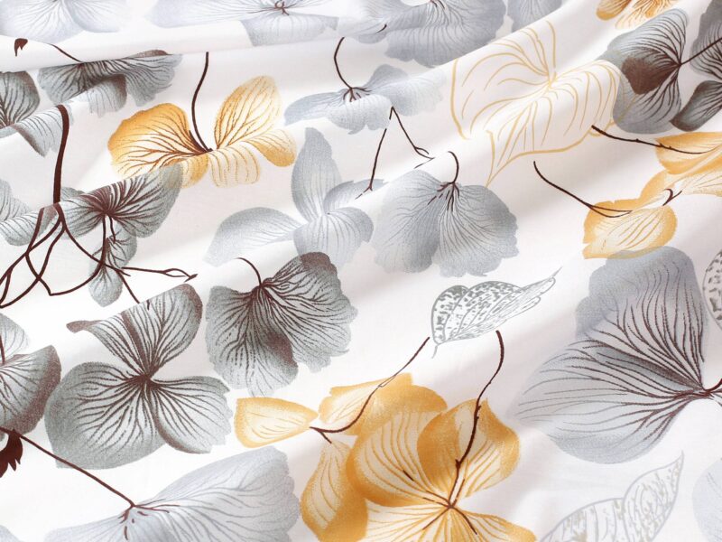 100% Cotton fabric grey-brown flower on white by Stofex.