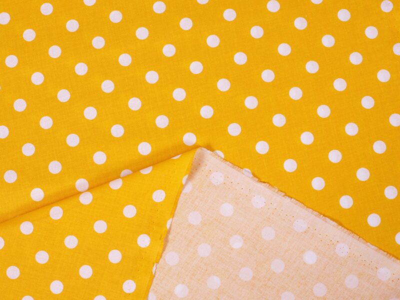 Cotton fabric large polka dots on yellow by Stofex.