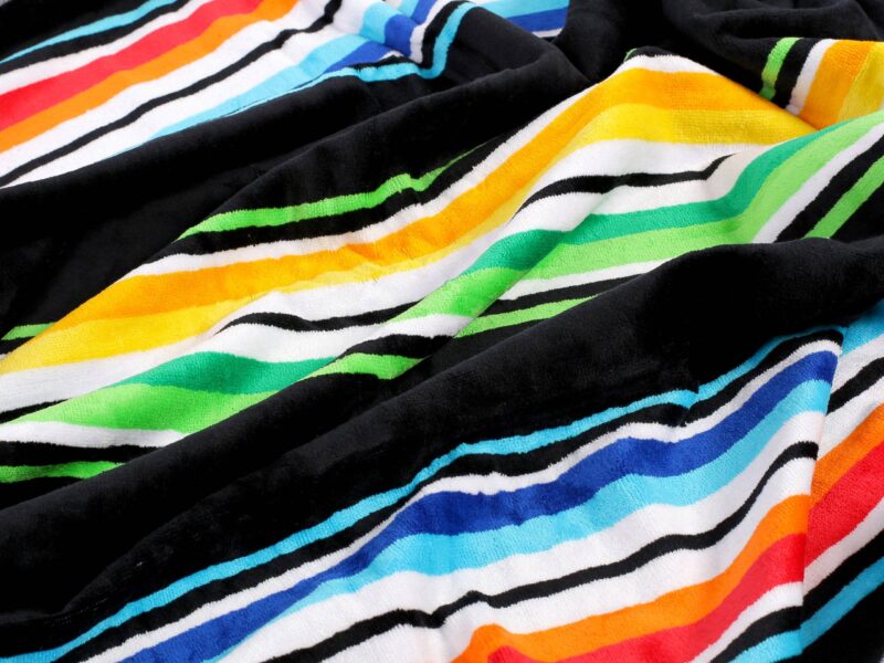 Large beach towel with stripes and black background by Stofex.