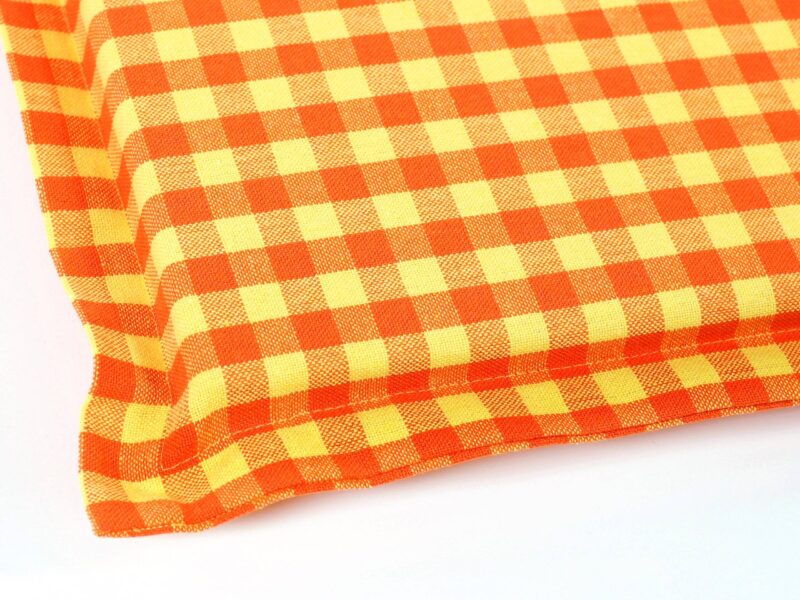 Heavy-duty square chair pad with hem - yellow-orange plaid by Stofex.