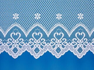 Decorative sheer curtain with peasant motif - 3805 by Stofex.