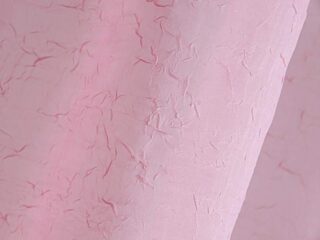 Cressed voile pink with sewn-in weights 1018 by Stofex.