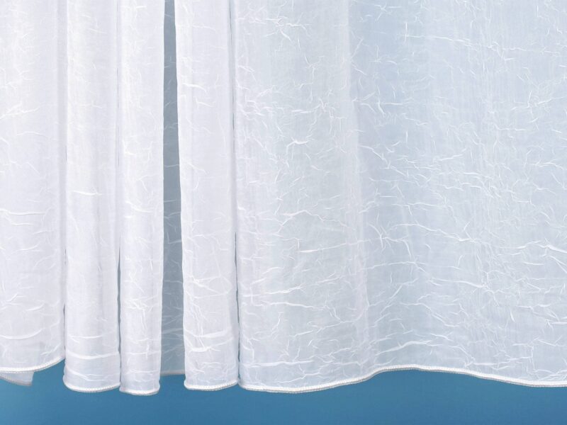 Cressed voile white with sewn-in weights 1031 by Stofex.