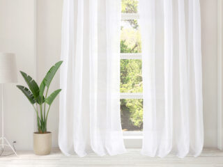 Voile white with sewn-in weights 0101 by Stofex.