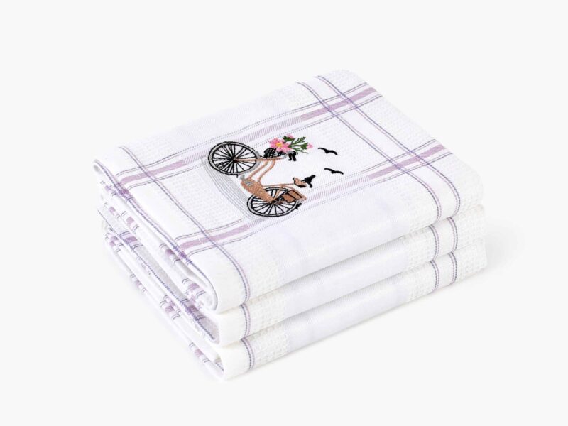 Waffle kitchen towel with bike and purple stripes from 100% cotton.