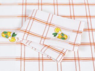 Waffle kitchen towel with juice and orange stripes from 100% cotton.