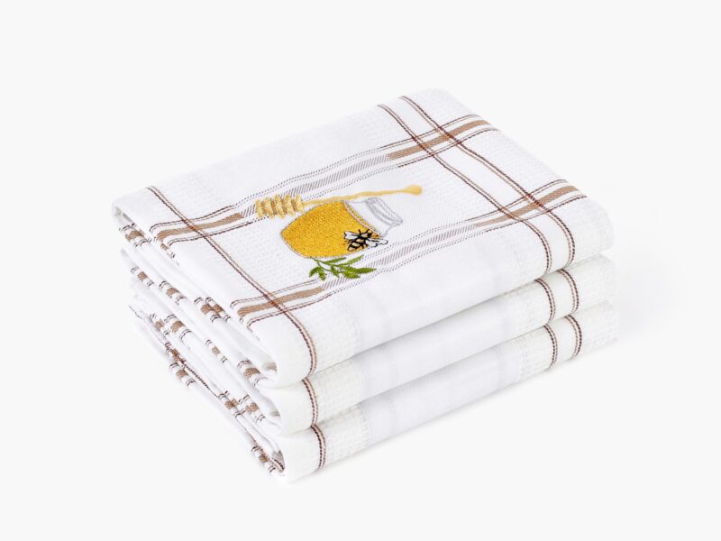 Waffle kitchen towel with honey jar and brown stripes from 100% cotton.