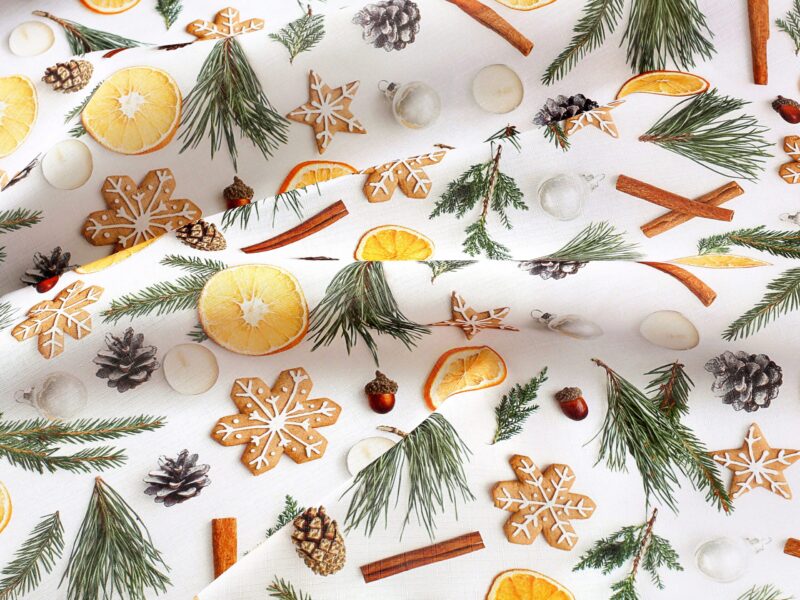 Christmas teflon fabric gingerbread and orange on white width 160 cm by Stofex.