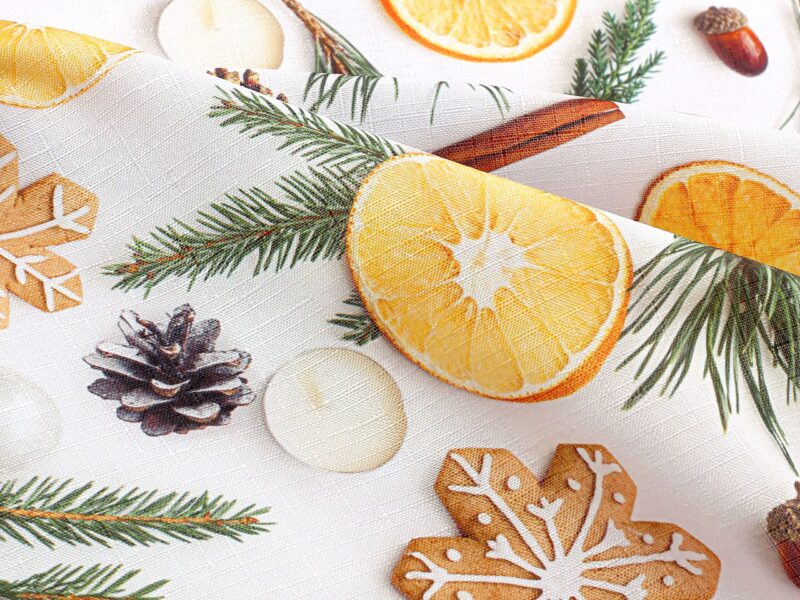 Christmas teflon fabric gingerbread and orange on white width 160 cm by Stofex.