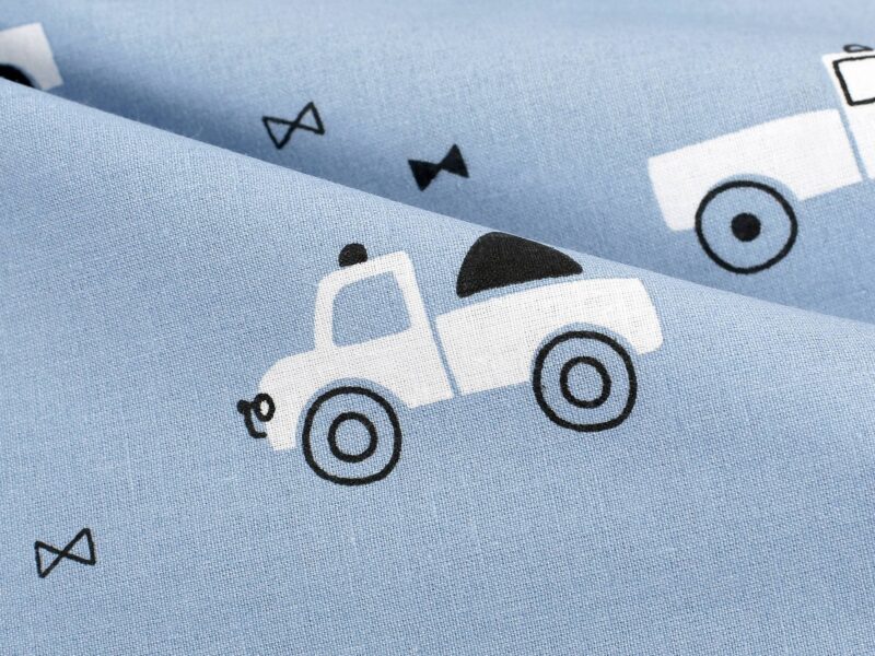 Cotton fabric white cars on blue by Stofex.