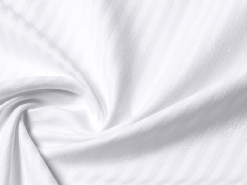 White damask bed linen with 4 mm stripes by Stofex.