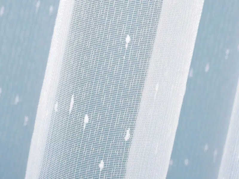 Jacquard sheer curtain with rain motif 163 by Stofex.