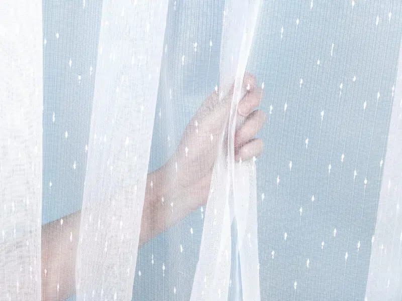 Jacquard sheer curtain with rain motif 163 by Stofex.