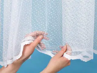 Jacquard sheer curtain with polka dots pattern 101215 by Stofex.