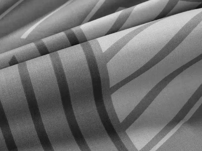 Cotton fabric geometric stripes on grey by Stofex.