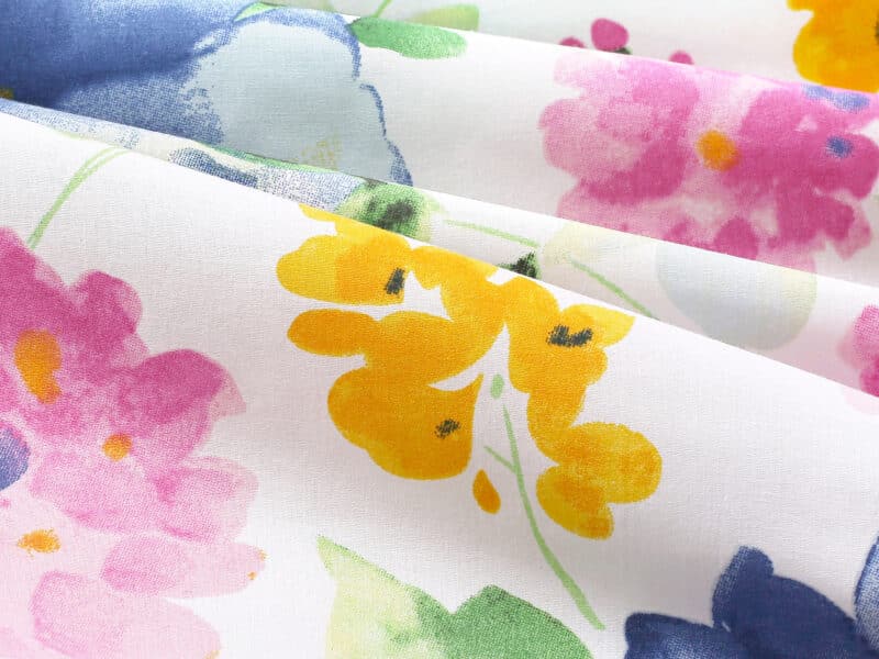 100% Cotton fabric flowers on white by Stofex.