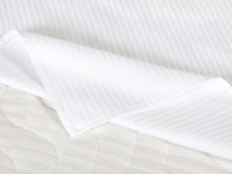 Damask flat sheet in white stripes 4 mm by Stofex.