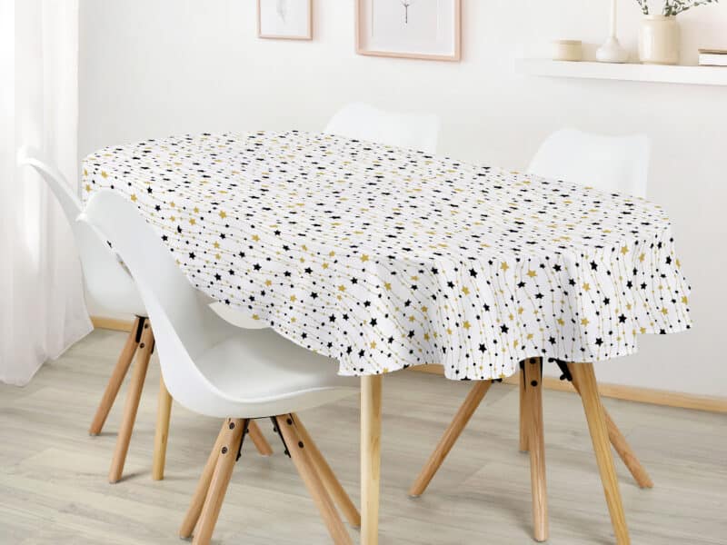 Christmas oval cotton tablecloth gold and black stars on white by Stofex.