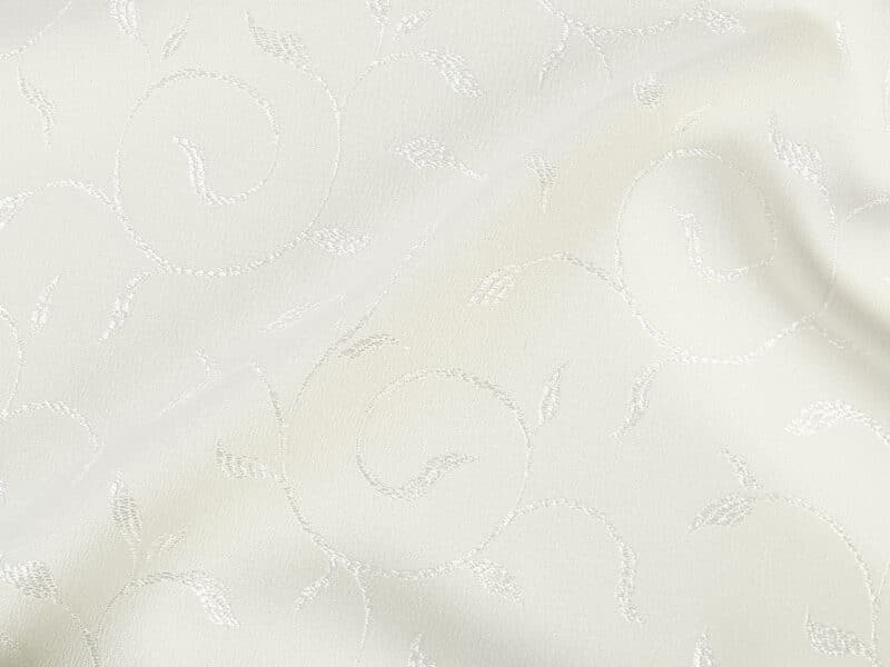 Teflon fabric with ornaments cream width 158 cm by Stofex.