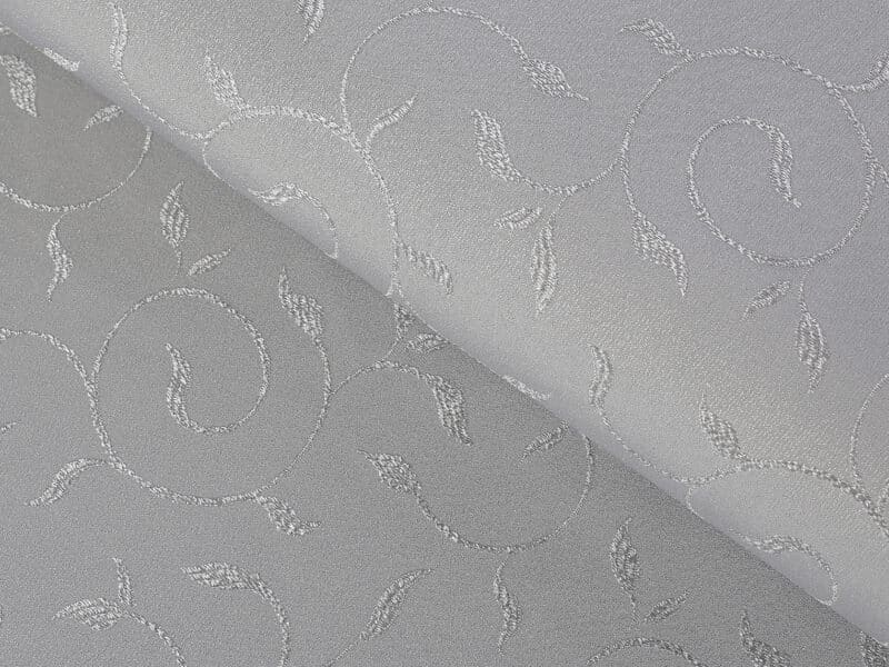 Teflon fabric with ornaments grey width 158 cm by Stofex.