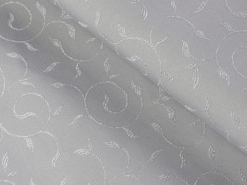 Teflon fabric with ornaments grey width 158 cm by Stofex.