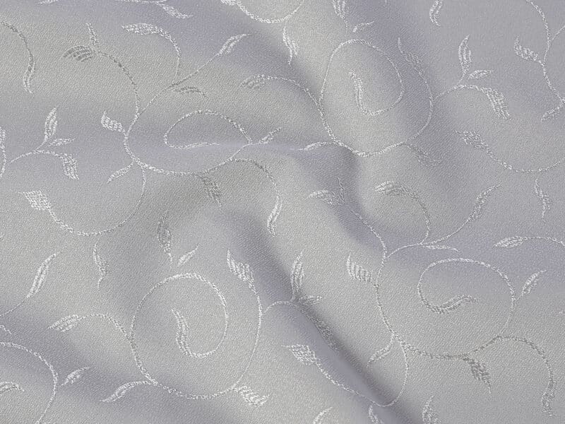 Teflon fabric with ornaments grey width 158 cm by Stofex.