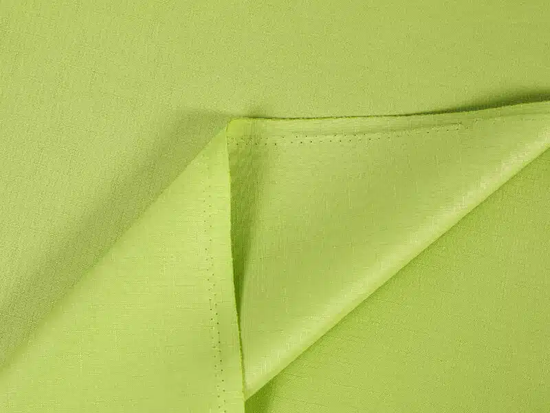 Teflon fabric green width 160 cm by Stofex.