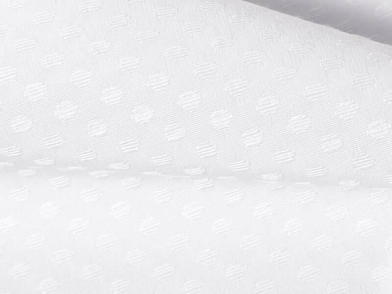 Teflon fabric with dots white width 160 cm by Stofex.