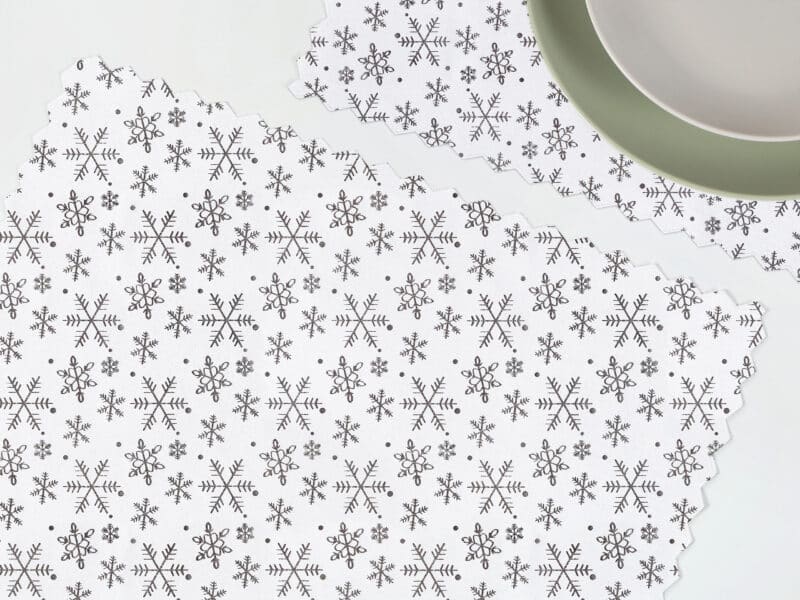 Teflon placemat snowflakes on white by Stofex.