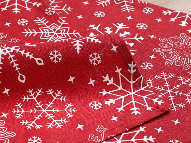 Christmas terra cotton placemat snowflakes on red by Stofex.