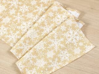 Christmas cotton table runner snowflakes on beige by Stofex.